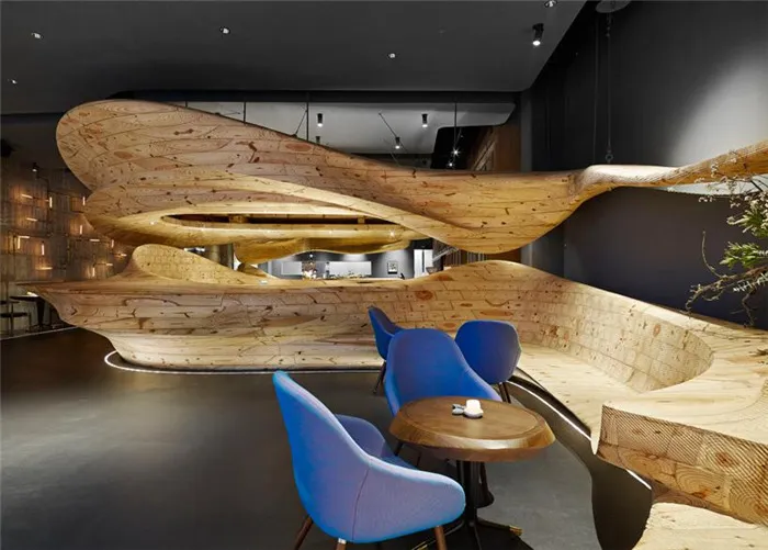 WEIJENBERG Weaves Sculpted Timber Element Around RAW Restaurant