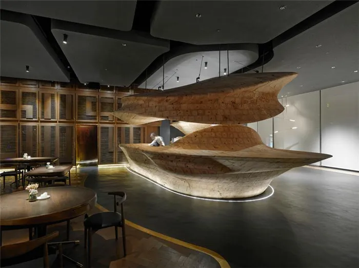 WEIJENBERG Weaves Sculpted Timber Element Around RAW Restaurant
